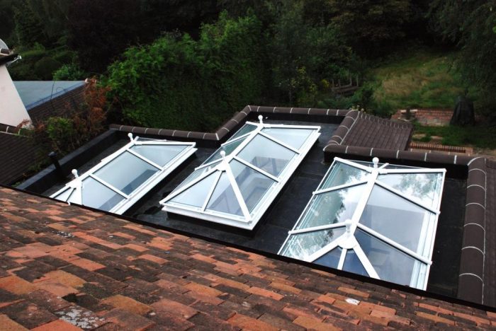 Roof lanterns in kitchen/family/dining space from outside