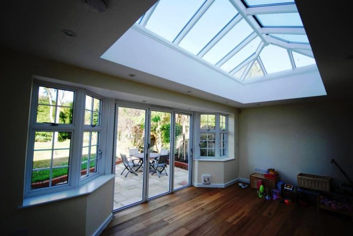 Orangery style extension with bi-fold doors and roof lantern over