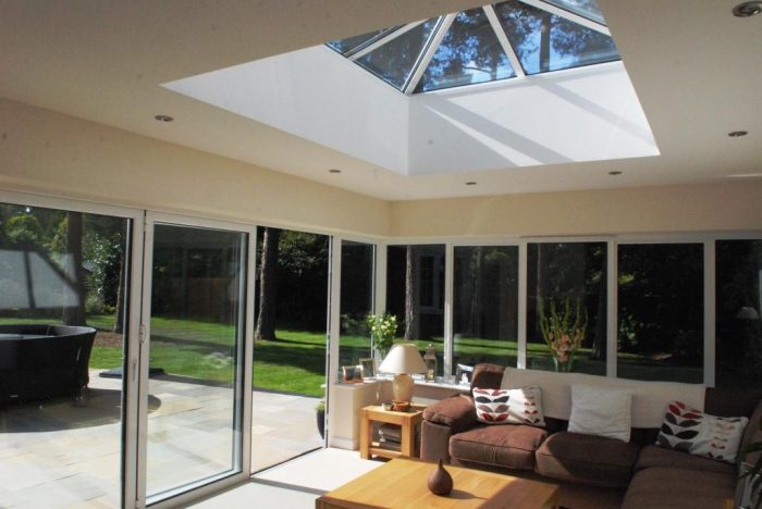 Orangery style extension with minimalist corner post and roof lantern