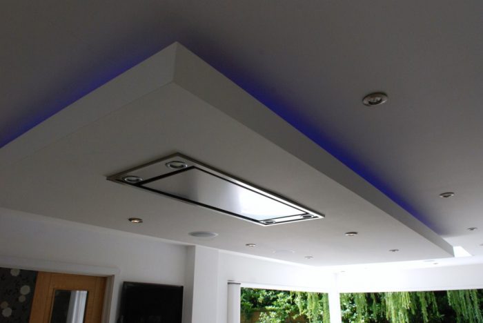Island feature conceals extractor fan ducting and provides interesting decorative feature with LED lighting