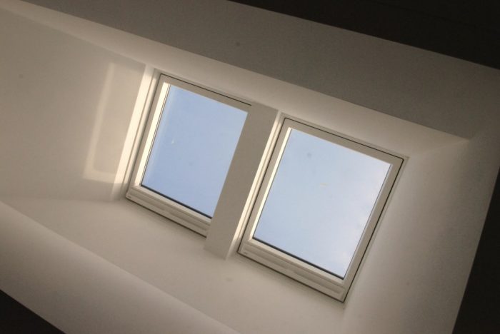Velux windows over landing bring an abundance of natural daylight into the landing and hallway below
