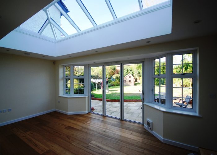 Orangery style extension with bi-fold doors and roof lantern over