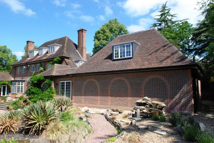 Rear of garage with decorative brickwork to create interest and to use as a backdrop for subsequent soft planting