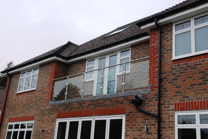 Rear balcony glazed balustrade system