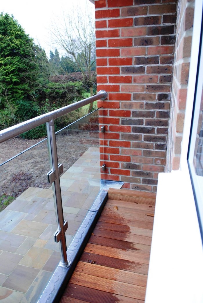 Rear balcony glazed balustrade system