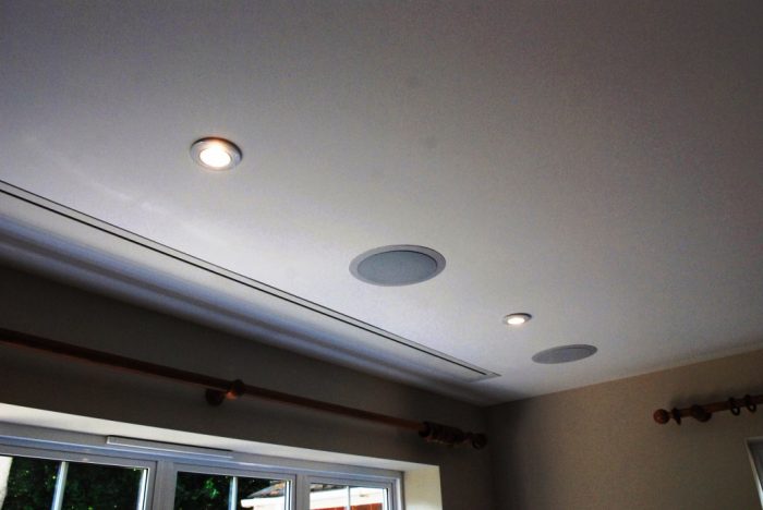 Project screen in up position concealed within ceiling