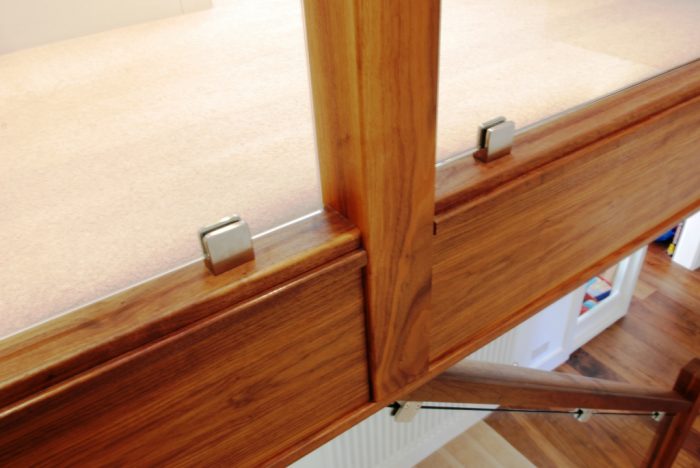 Walnut staircase with glazed balustrade